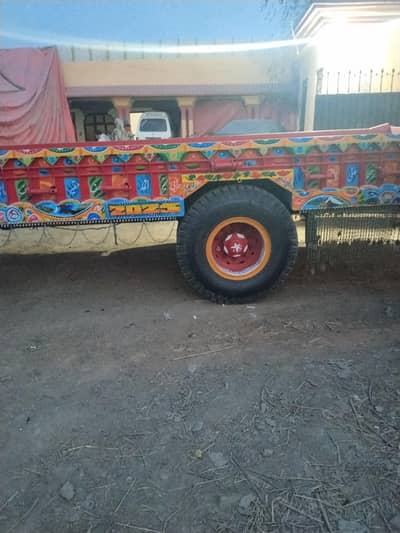 260 tractor and 18foot tralla