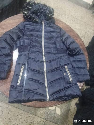 blue puffer lady jacket