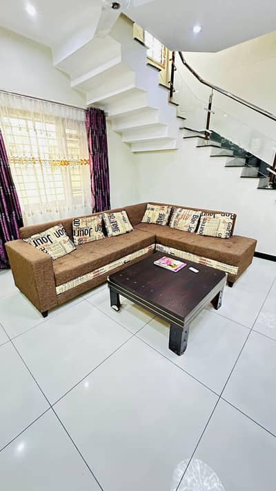 slightly used L shape sofa with free table