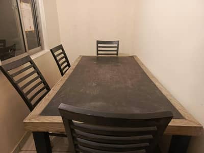 Dining table with 4 chairs and 1 long saiti, gray fabric