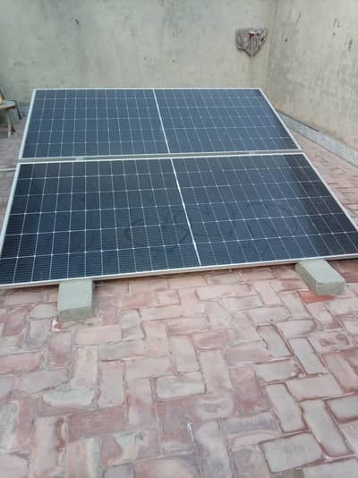 2 solar panels + 1200W hybrid solar inverter