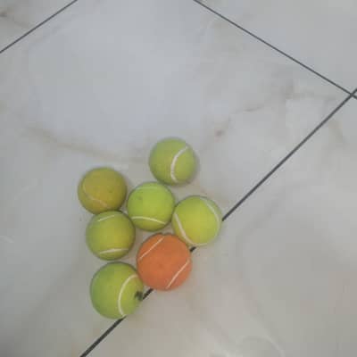 slightly used branded tennis balls for sale