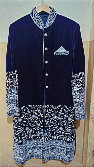 velvet shairwani sirf ak dafa use hui hai. . . price 20000 hazar 100% new