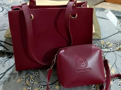 mehroon leather handbag