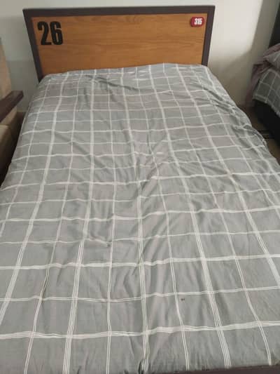 imported 2 single beds with mattresses and side table