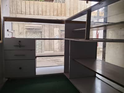 2 counters and wall shelves racks