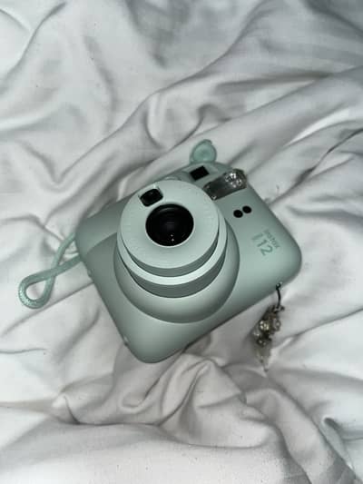 Instax mini 12 poloraid camera fujifilm with free 10 films