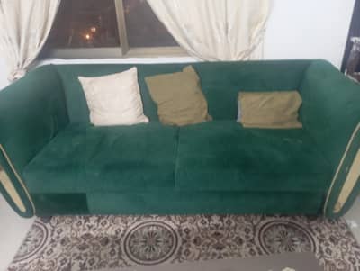 sofa set 5 seater and green in colour