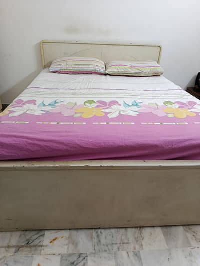 Queen size bed with mattress and storage box