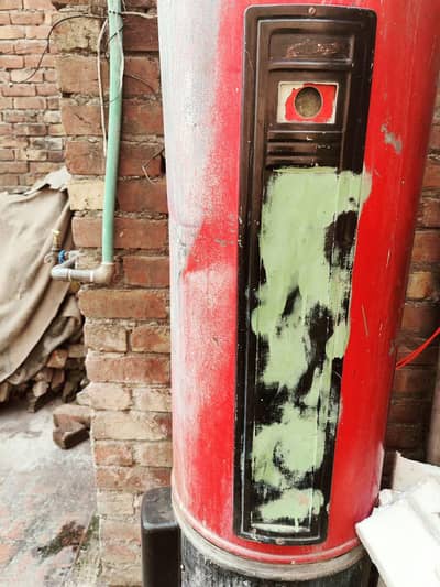 electric and gas geezer old but A one working