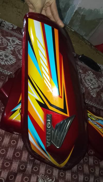 honda 125 new fuel tanks with side covers see description