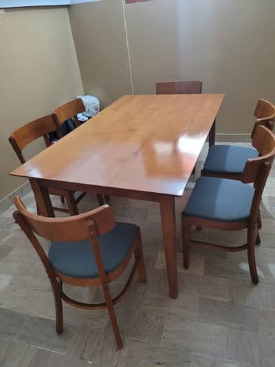 Imported dinning table with six chairs.