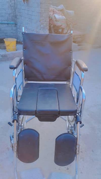 wheels chair with toilet accessibility