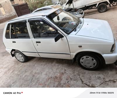 mehran car white 2015 model