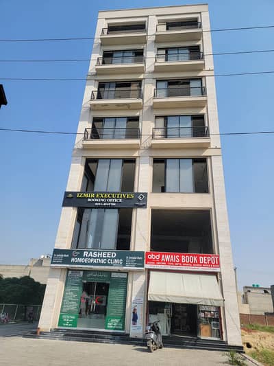 16 MARLA brand new 1st entry commercial hall available for rent in Izmir town Lahore