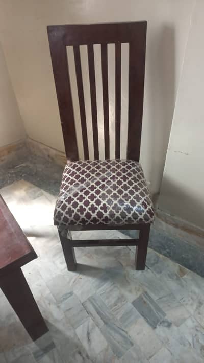 One dinning Table with 6 chairs