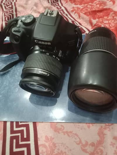 Canon 1500D DSLR Camera with 18-55mm Lens + 75-300mm Lens (Free)