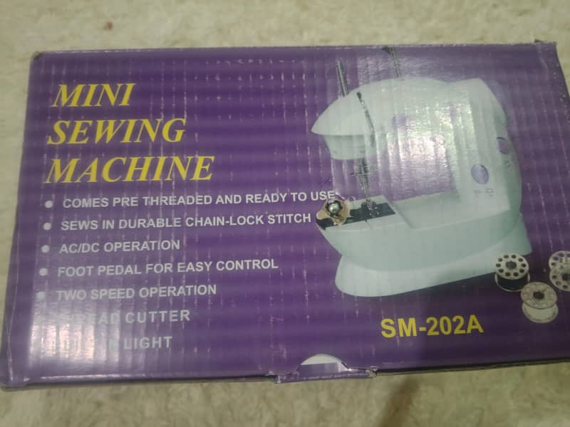 mini sewing machine 1
