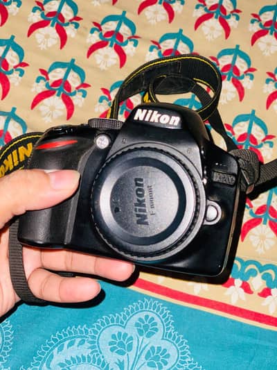 Nikon D3200 with 18:55mm and 70:300mm with FREE Tripod