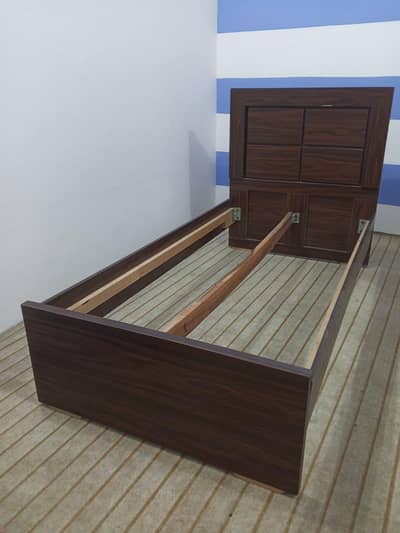 2beds (single) one cupboard