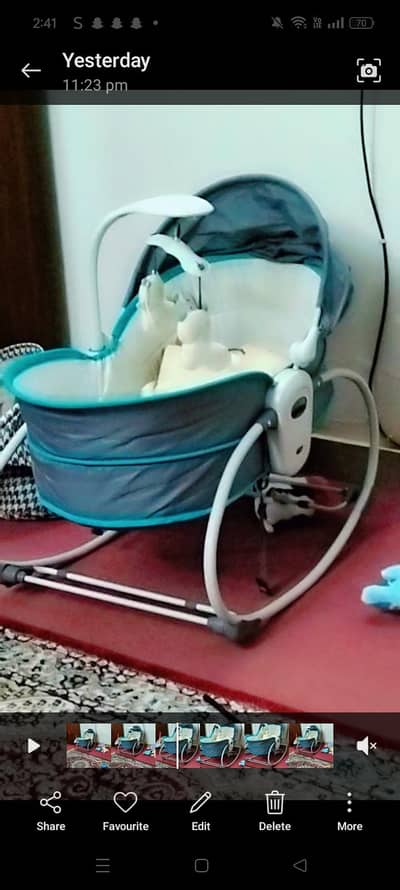 mestela manual musical vibration swing with toys hanging condition lik