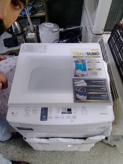 03119142990  washing machine top load 7 kg