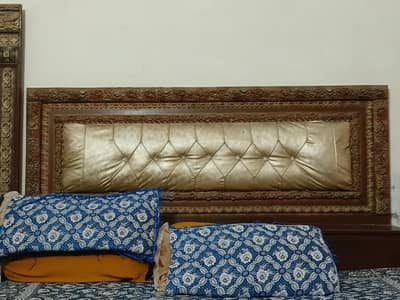 Full size double bed wooden made with box for pillow adjustment . .