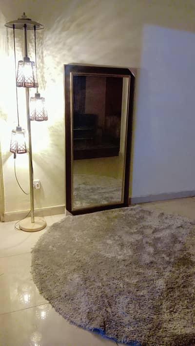 Lamp, mirror and rug