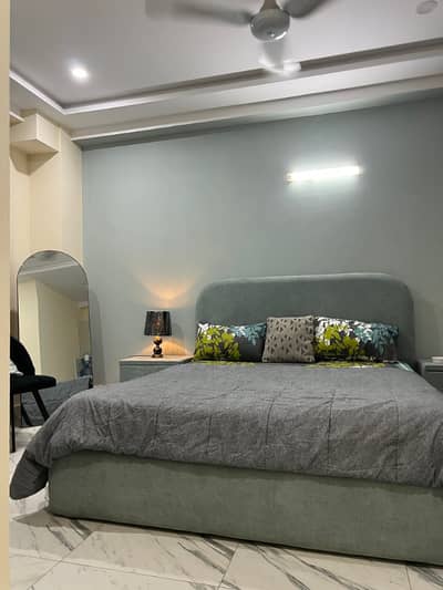 One bed apartment per day available Gulbarga green Islamabad