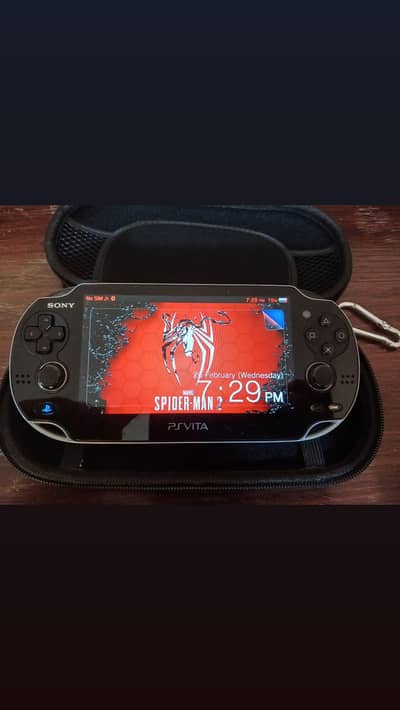 PS VITA 1000 OLED DISPLAY GAMING CONSOLE