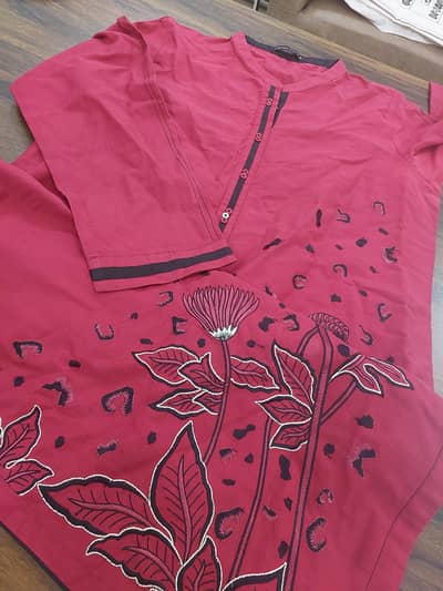 1 piece - heavily Embroidered stitched kurta.