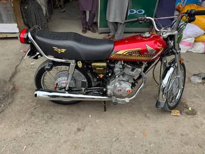 125 gold adtion 25 model
