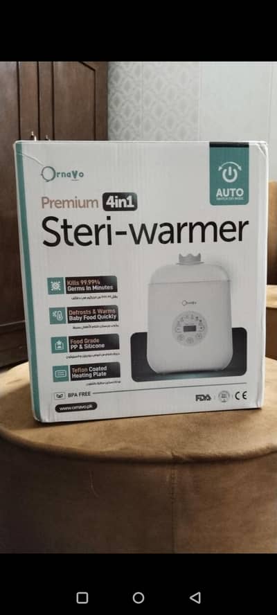 FEEDER WARMER DOR CHILDREN IN 10/10 CONDITION