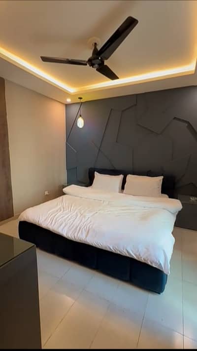 1 And 2,3 Bed available For Booking Daily weekly and Monthly Basis in F-11 Islamabad.