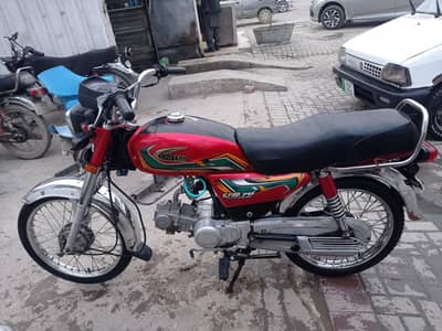 Red United 70cc good condition all punjab number