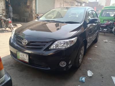 car. Toyota Corolla xli. colour black price. 26 lacs