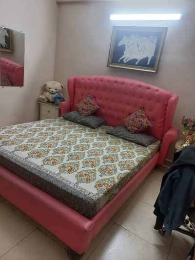 Bed with side tables