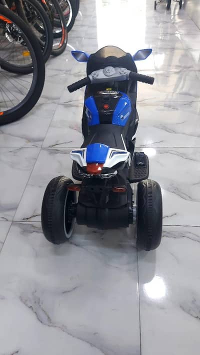 there wheel electric bike for kids import from dubia.