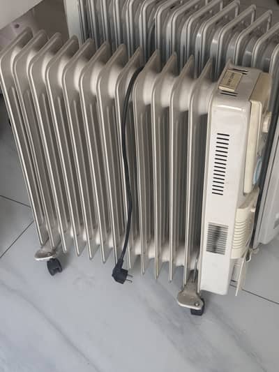 14 FINS OIL Heater, less than half price.