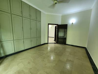 Secure Surroundings &Amp; Prestigious Address 10-Marla Signature Style Architecture Bunglow With 5-Bedrooms, 2-Kitchens, Servant Quarter & Lush Green Lawn Available For Rent In DHA Phase 8 With Easy Deal By Wall Green Realtors