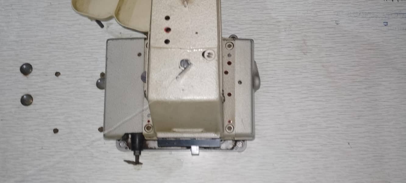 kaaj button machine 1