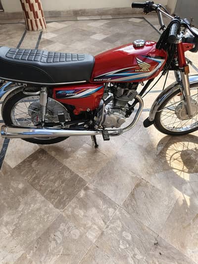 Honda 125 karachi num 2022 model apna saman bi available he