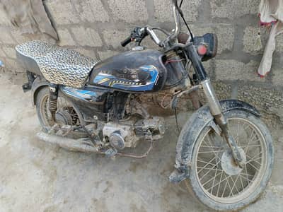 champion bike 70cc  bilkul ok hi front tayer  back wala da la Hua hi