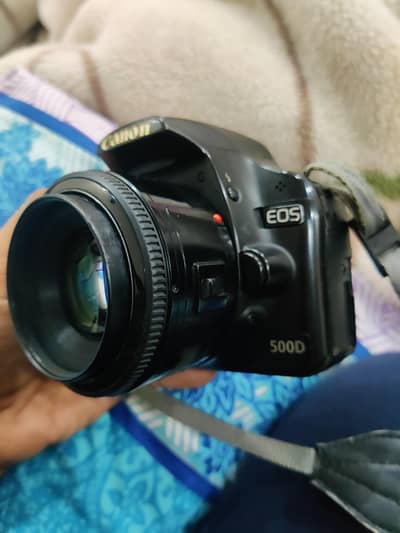 canon 500d dslr camera with 50mm lens nikon/sony/iphone