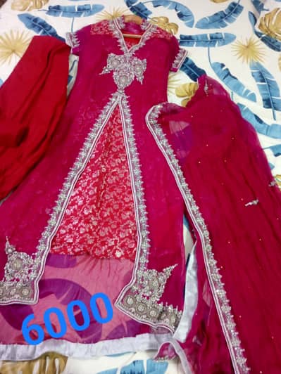 red gown with silver hand work
