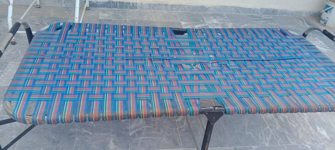 iron folding charpai less used