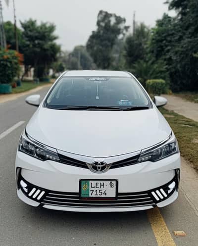 TOYOTA COROLLA GLI Special edition supr white far sak