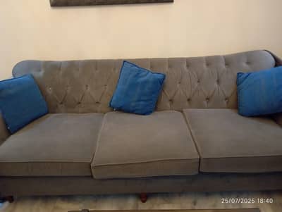 5 seater sofa with wooden table and side tables