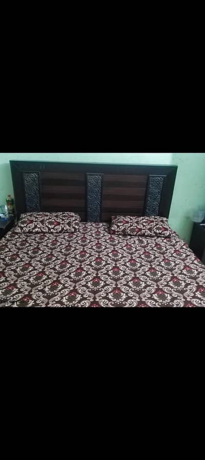 King size bed with two side table