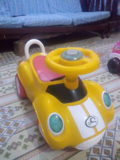 Kids Cycle, walker, and carry Cot for sale.